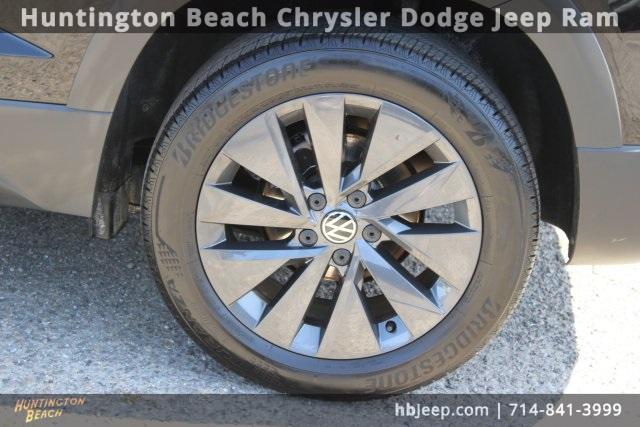 used 2023 Volkswagen Taos car, priced at $21,450