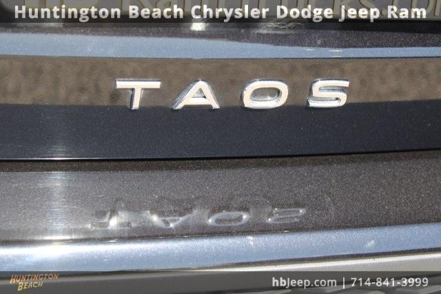 used 2023 Volkswagen Taos car, priced at $21,450
