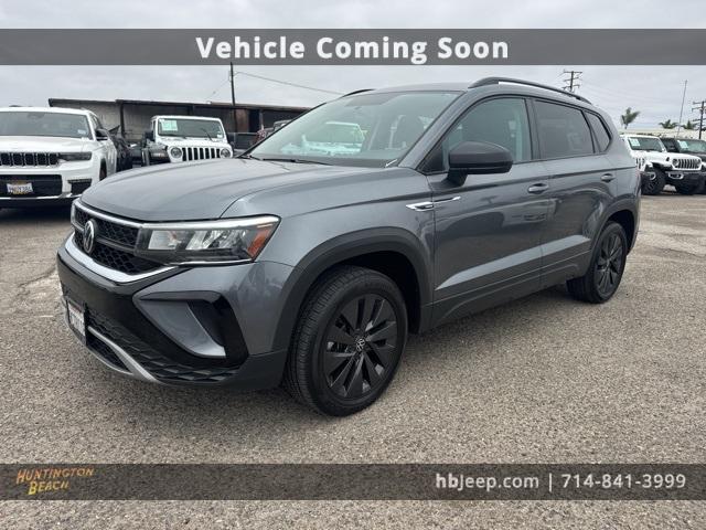 used 2022 Volkswagen Taos car, priced at $15,374
