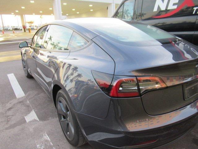 used 2023 Tesla Model 3 car, priced at $25,990