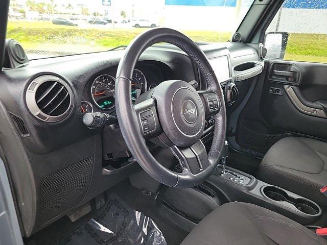 used 2014 Jeep Wrangler Unlimited car, priced at $16,990