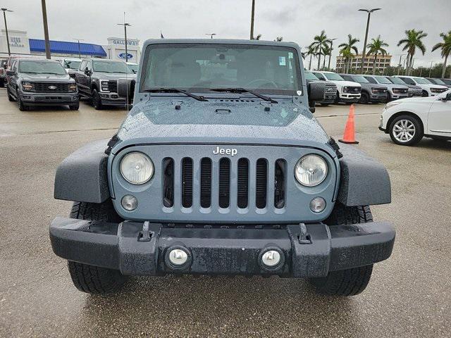 used 2014 Jeep Wrangler Unlimited car, priced at $16,990