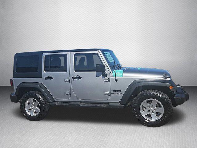 used 2014 Jeep Wrangler Unlimited car, priced at $21,625