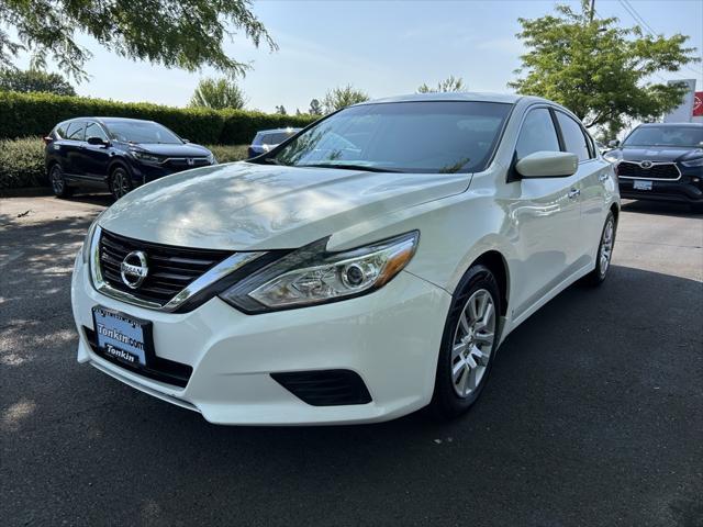 used 2018 Nissan Altima car, priced at $9,999