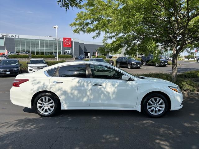used 2018 Nissan Altima car, priced at $9,999