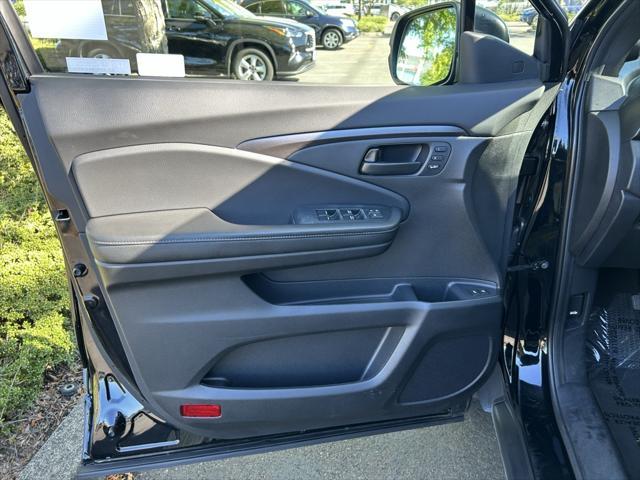 used 2023 Honda Passport car, priced at $33,000