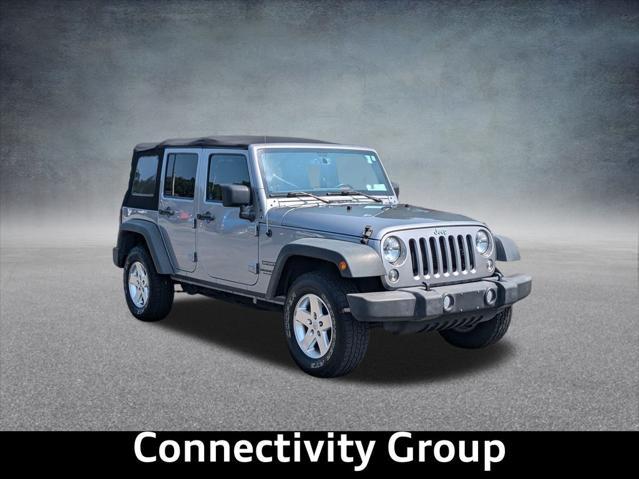 used 2014 Jeep Wrangler Unlimited car, priced at $15,450