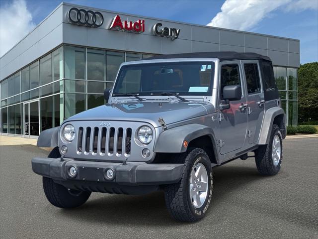 used 2014 Jeep Wrangler Unlimited car, priced at $13,950