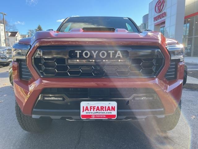 used 2024 Toyota Tacoma Hybrid car, priced at $65,870