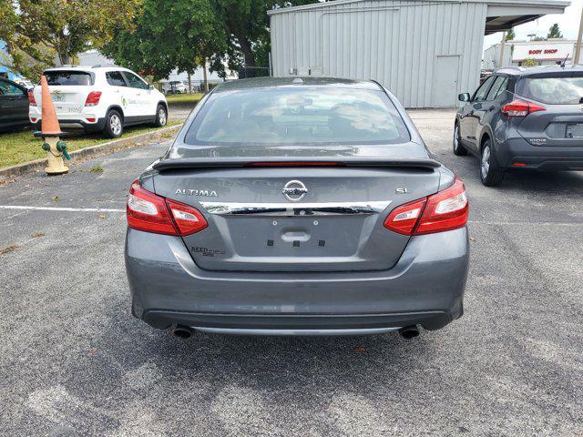 used 2016 Nissan Altima car, priced at $13,999