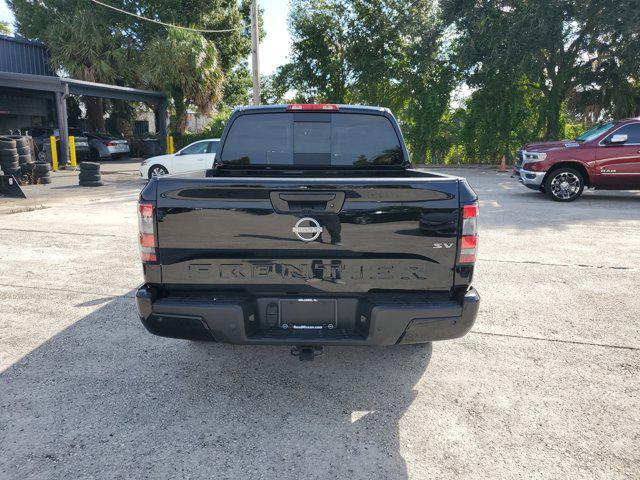 used 2024 Nissan Frontier car, priced at $27,999