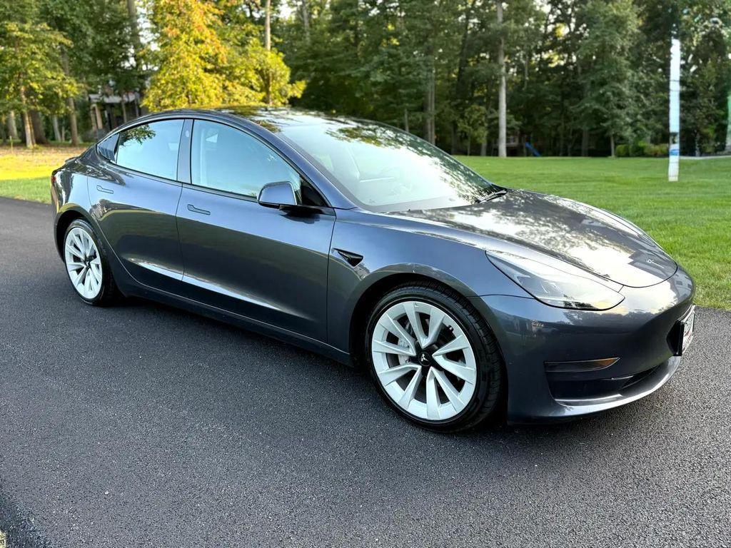 used 2023 Tesla Model 3 car, priced at $20,990