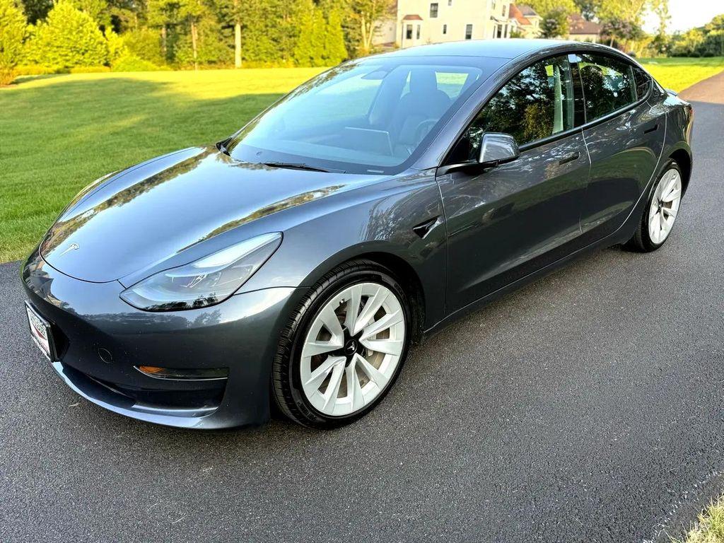 used 2023 Tesla Model 3 car, priced at $20,990