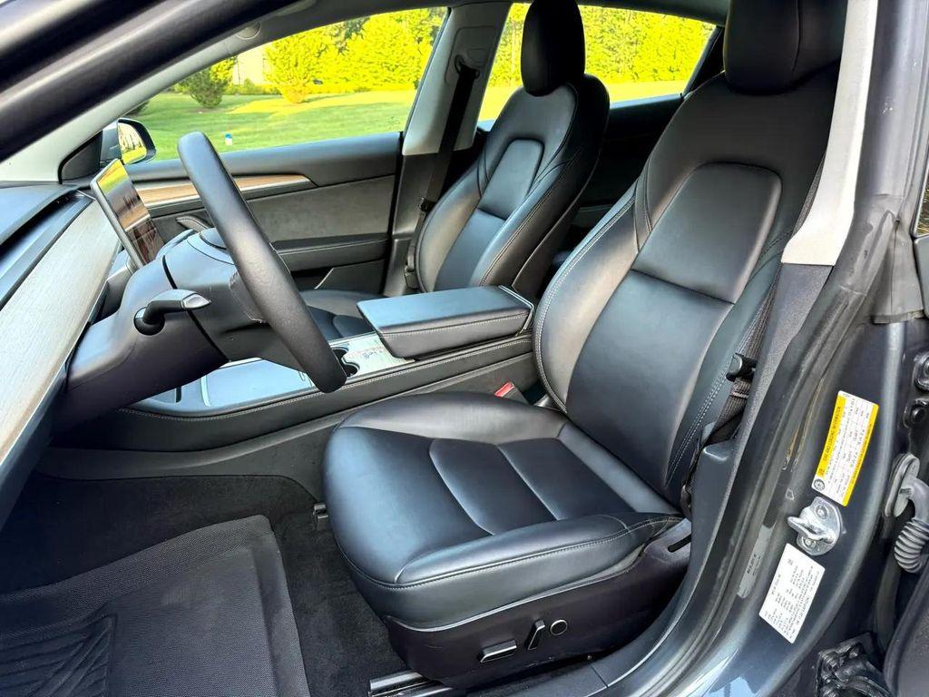 used 2023 Tesla Model 3 car, priced at $20,990
