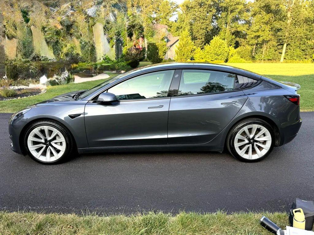 used 2023 Tesla Model 3 car, priced at $20,990