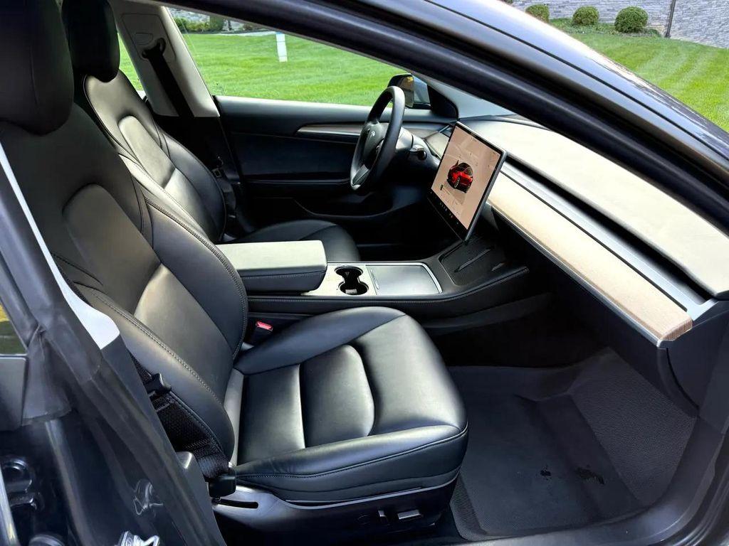 used 2023 Tesla Model 3 car, priced at $20,990