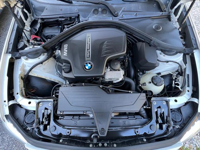 used 2014 BMW 228 car, priced at $15,990