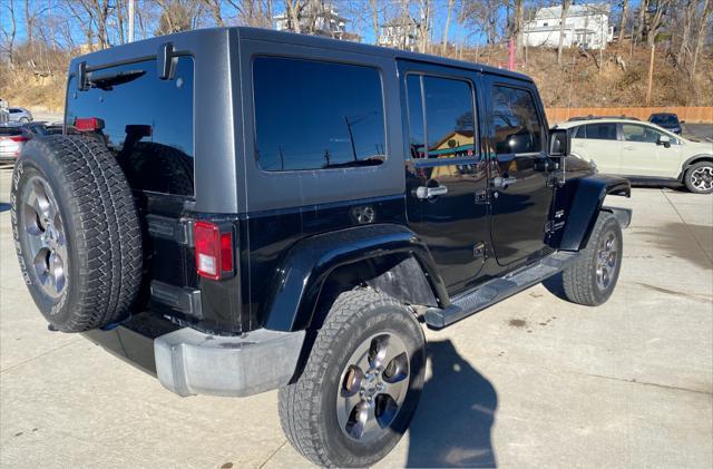 used 2018 Jeep Wrangler JK Unlimited car, priced at $22,990