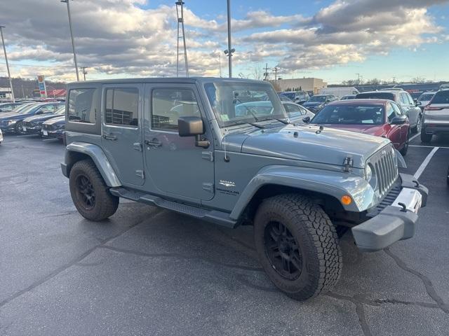 used 2014 Jeep Wrangler Unlimited car, priced at $17,872