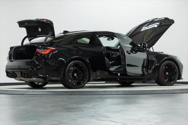 used 2023 BMW M4 car, priced at $77,406