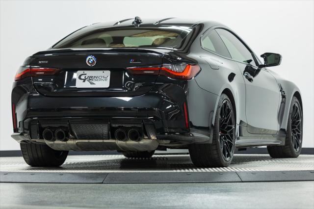 used 2023 BMW M4 car, priced at $77,406