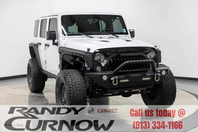 used 2015 Jeep Wrangler Unlimited car, priced at $23,499