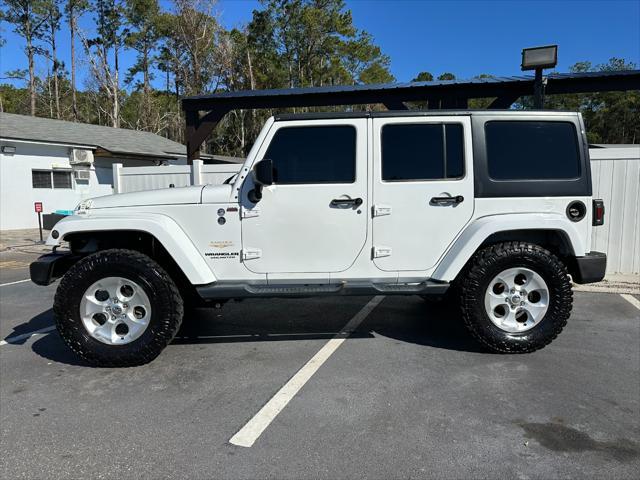 used 2013 Jeep Wrangler Unlimited car, priced at $15,995