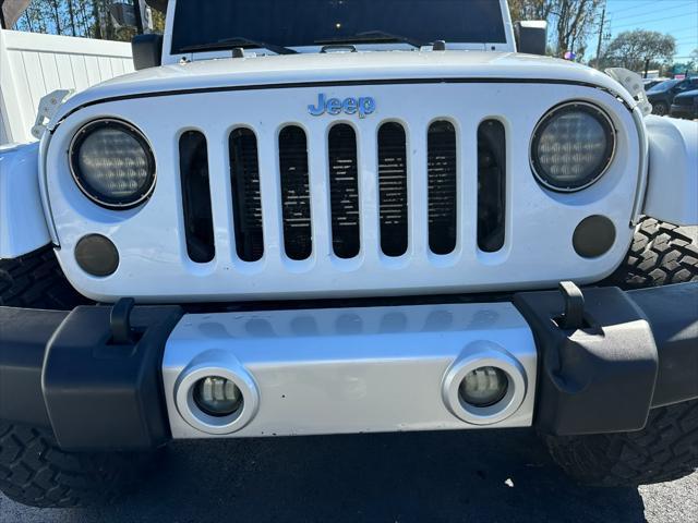 used 2013 Jeep Wrangler Unlimited car, priced at $15,995