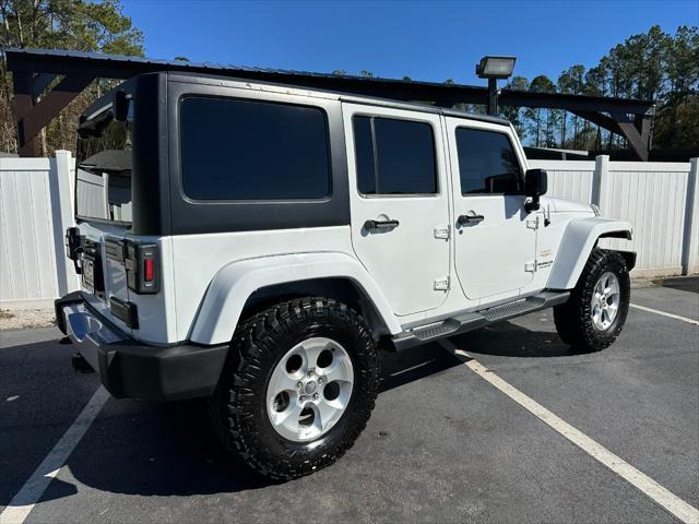 used 2013 Jeep Wrangler Unlimited car, priced at $15,995