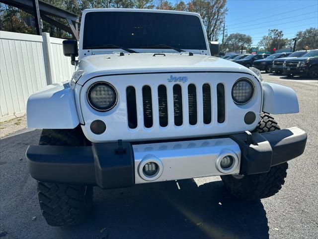 used 2013 Jeep Wrangler Unlimited car, priced at $15,995