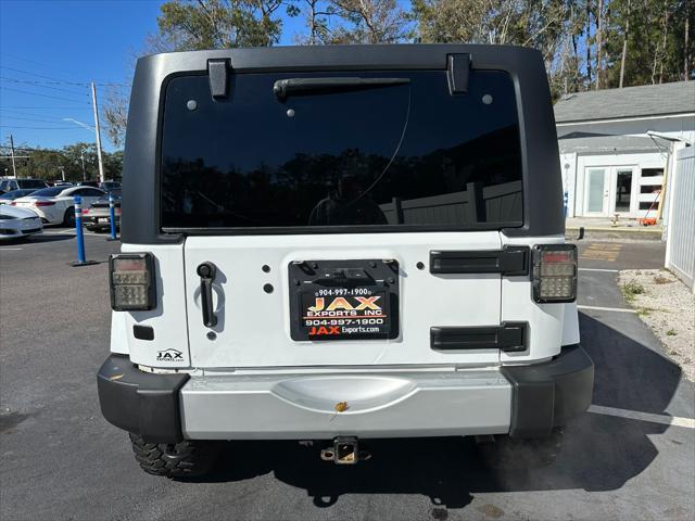 used 2013 Jeep Wrangler Unlimited car, priced at $15,995