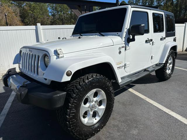 used 2013 Jeep Wrangler Unlimited car, priced at $15,995