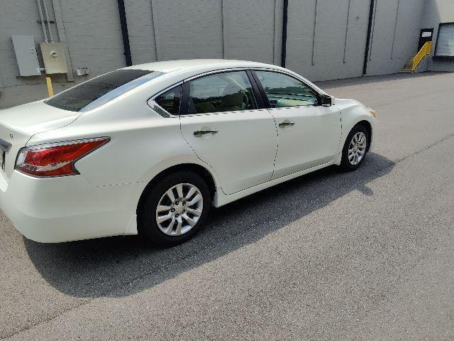 used 2015 Nissan Altima car, priced at $9,999