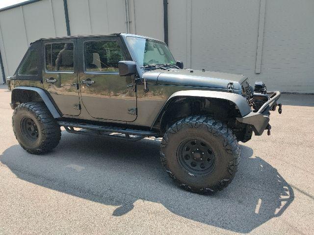 used 2010 Jeep Wrangler Unlimited car, priced at $12,999
