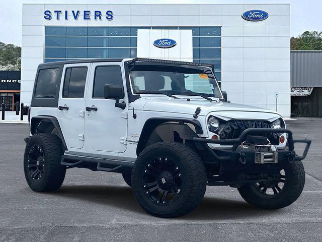 used 2013 Jeep Wrangler Unlimited car, priced at $17,999