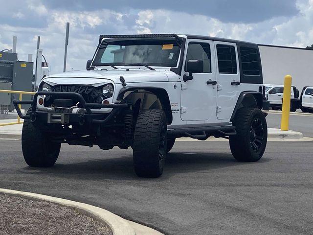 used 2013 Jeep Wrangler Unlimited car, priced at $17,999