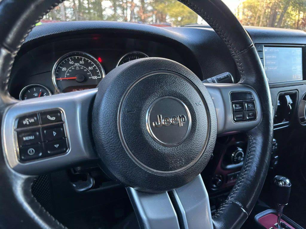 used 2016 Jeep Wrangler Unlimited car, priced at $19,721