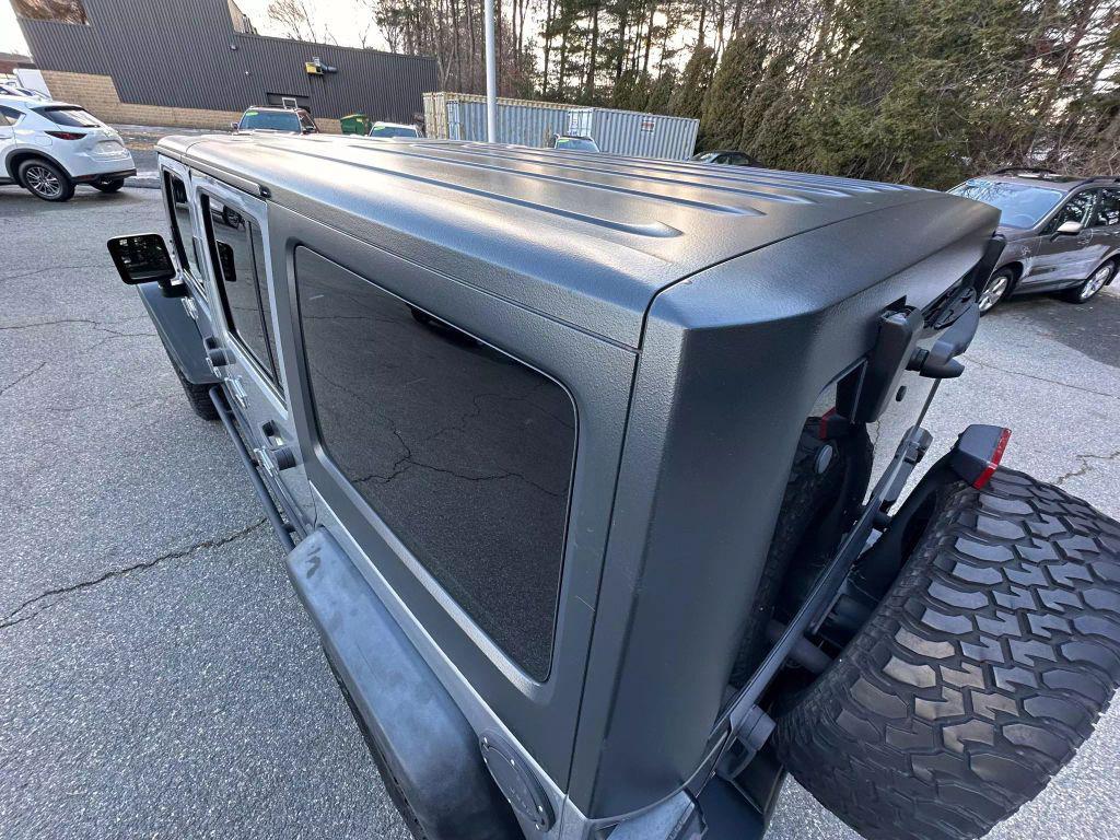 used 2016 Jeep Wrangler Unlimited car, priced at $19,721