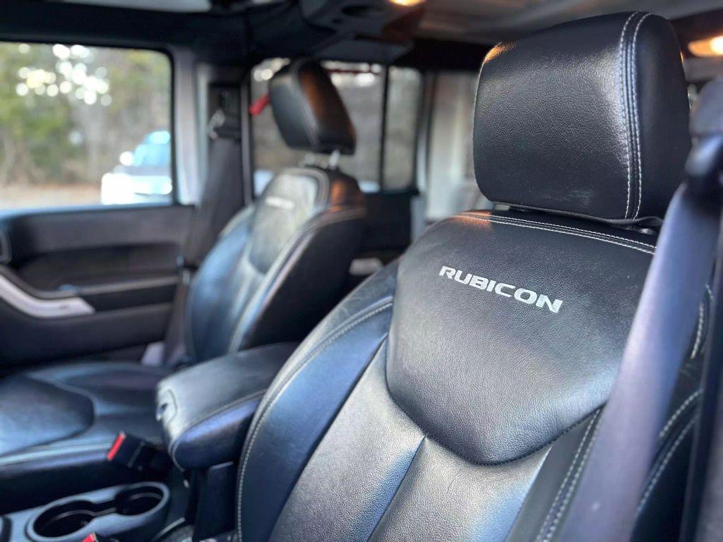 used 2016 Jeep Wrangler Unlimited car, priced at $19,721