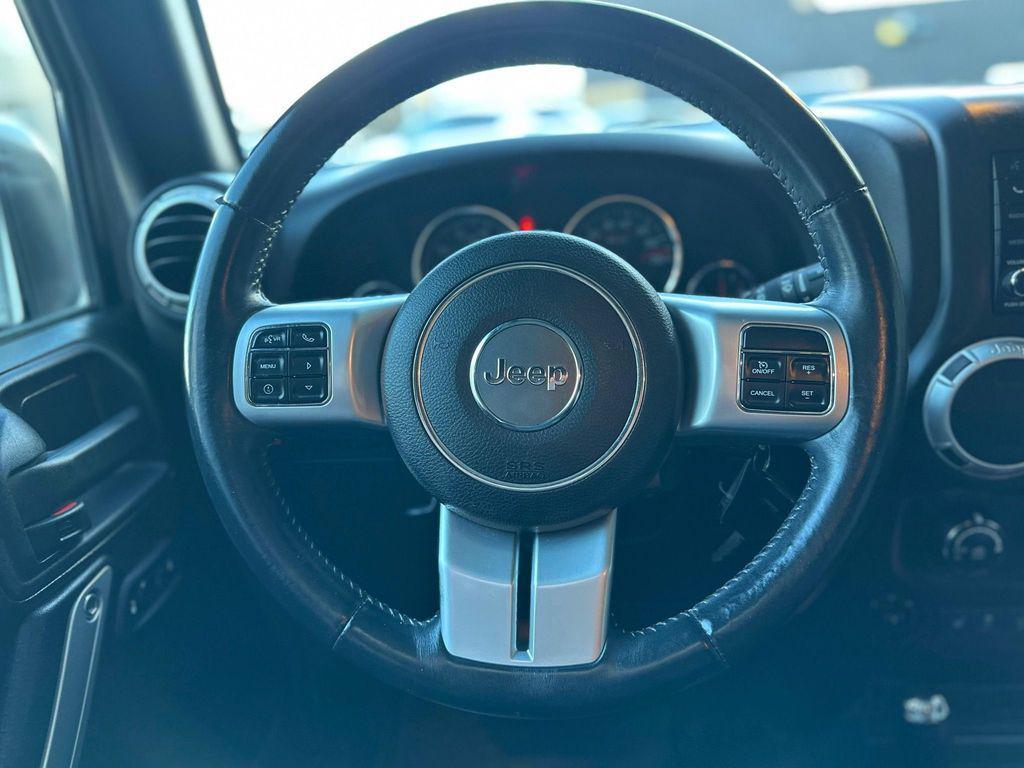 used 2016 Jeep Wrangler Unlimited car, priced at $19,721