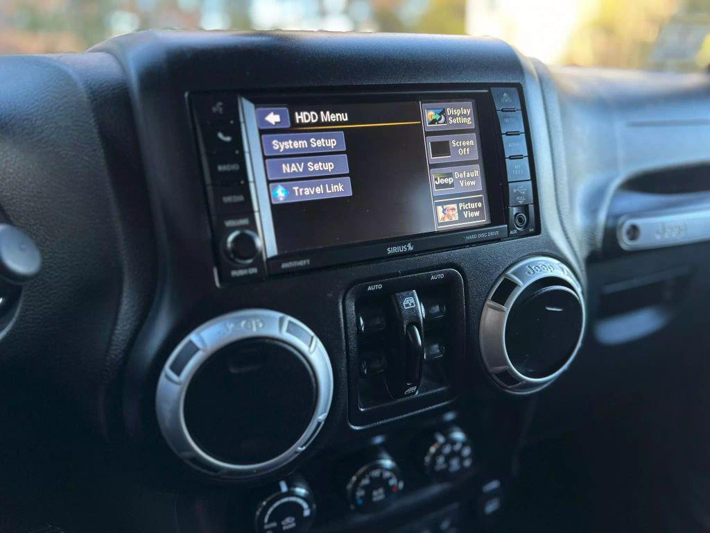 used 2016 Jeep Wrangler Unlimited car, priced at $19,721