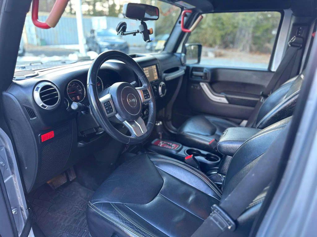used 2016 Jeep Wrangler Unlimited car, priced at $19,721