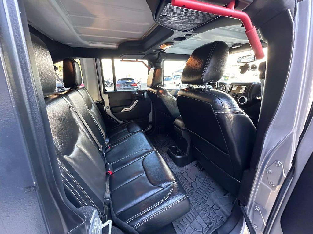 used 2016 Jeep Wrangler Unlimited car, priced at $19,721