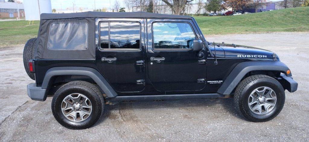 used 2015 Jeep Wrangler Unlimited car, priced at $17,999