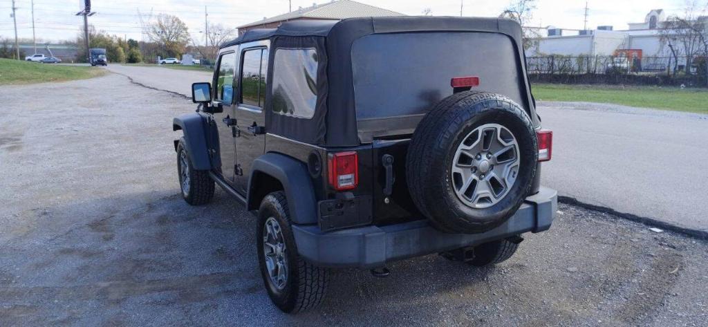 used 2015 Jeep Wrangler Unlimited car, priced at $17,999