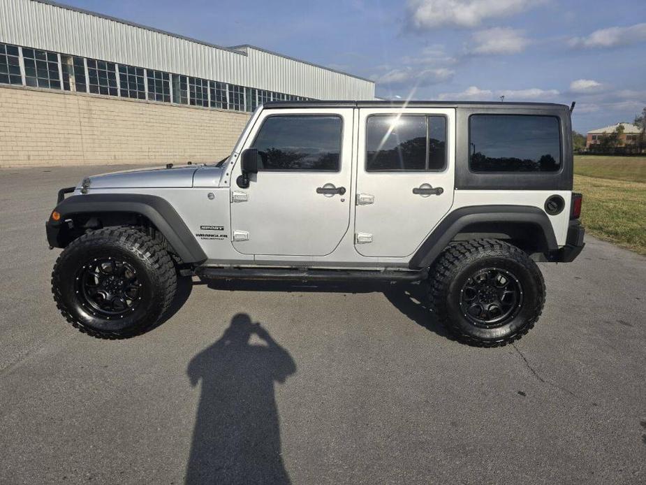 used 2012 Jeep Wrangler Unlimited car, priced at $15,999