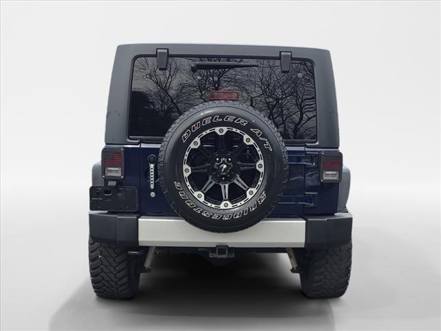 used 2013 Jeep Wrangler Unlimited car, priced at $17,490