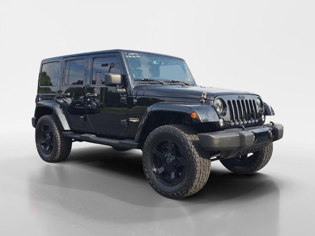 used 2013 Jeep Wrangler Unlimited car, priced at $19,990