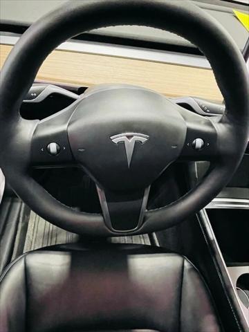 used 2021 Tesla Model Y car, priced at $28,998