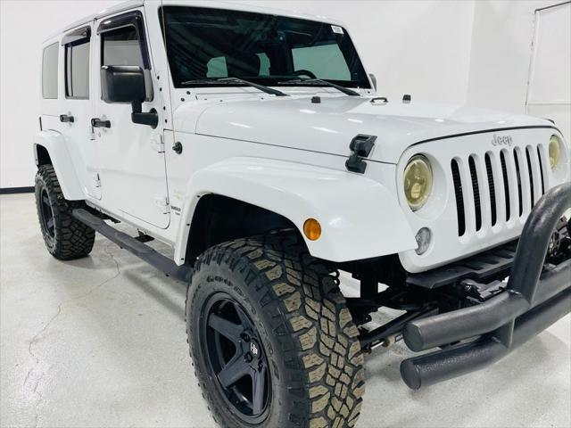 used 2014 Jeep Wrangler Unlimited car, priced at $19,298